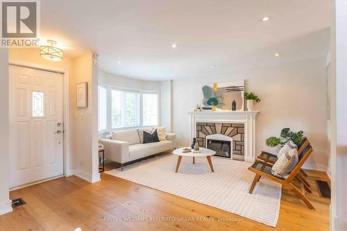 64 Superior Avenue, Toronto (Mimico), ON - Indoor Photo Showing Living Room With Fireplace