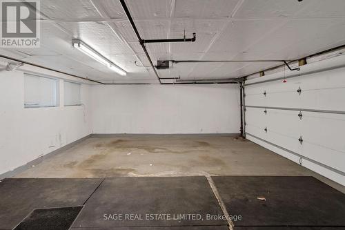 75 Sloping Sky Mews, Toronto (Niagara), ON - Indoor Photo Showing Garage