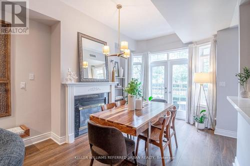 Th 15 - 1 Rean Drive, Toronto (Bayview Village), ON - Indoor Photo Showing Dining Room With Fireplace