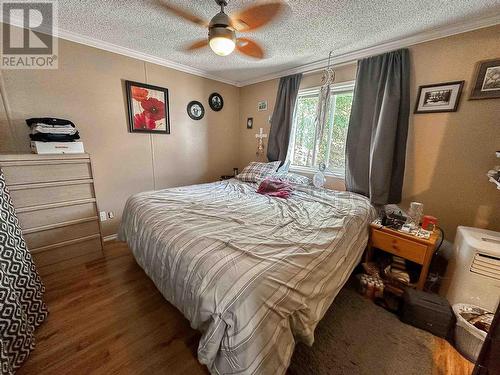 21 208 Eighth Street, 100 Mile House, BC - Indoor Photo Showing Bedroom