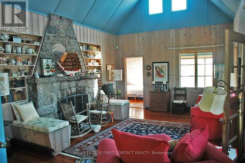 1 A249 Island, The Archipelago, ON - Indoor Photo Showing Living Room With Fireplace