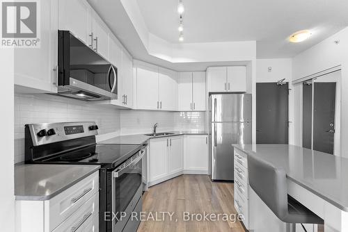 219 - 550 North Service Road, Grimsby, ON - Indoor Photo Showing Kitchen With Double Sink With Upgraded Kitchen