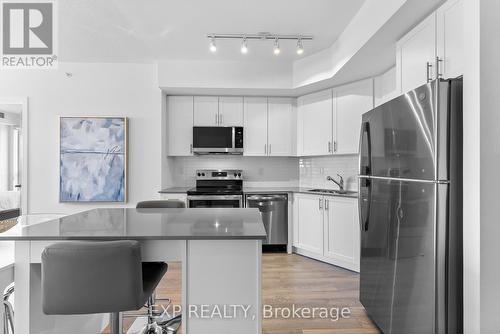 219 - 550 North Service Road, Grimsby, ON - Indoor Photo Showing Kitchen With Upgraded Kitchen