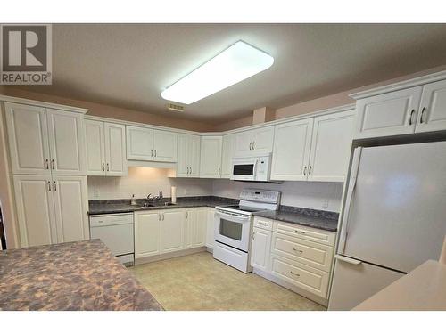 2285 Atkinson Street Unit# 603, Penticton, BC - Indoor Photo Showing Kitchen With Double Sink