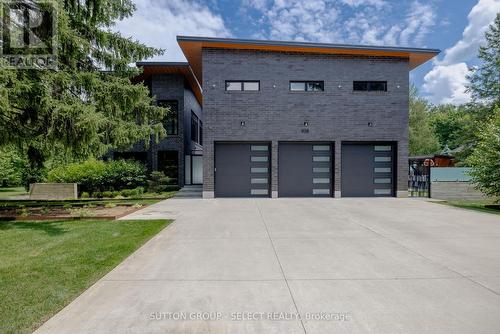 9385 Elviage Drive, London, ON - Outdoor With Facade