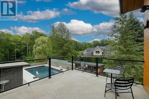 9385 Elviage Drive, London, ON - Outdoor With In Ground Pool