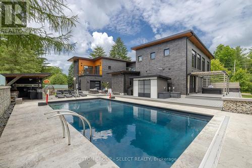 9385 Elviage Drive, London, ON - Outdoor With In Ground Pool