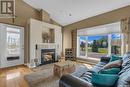 91 Rivers Edge Lane, Corman Park Rm No. 344, SK  - Indoor Photo Showing Living Room With Fireplace 