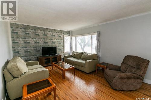 200 Russell Street, Luseland, SK - Indoor Photo Showing Living Room With Fireplace