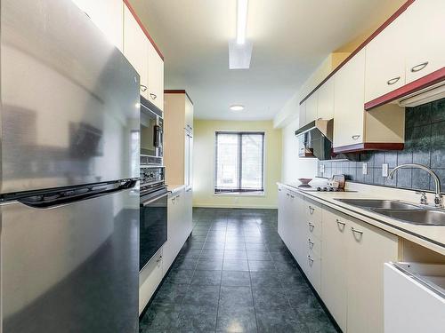 Kitchen - 7550 Rue Fonteneau, Montréal (Mercier/Hochelaga-Maisonneuve), QC - Indoor Photo Showing Kitchen With Double Sink