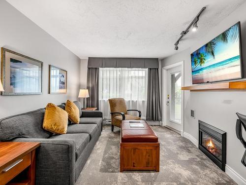 107A-1800 Riverside Lane, Courtenay, BC - Indoor Photo Showing Living Room With Fireplace