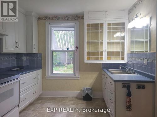 231 Mary Street, Guelph/Eramosa (Rockwood), ON - Indoor Photo Showing Kitchen With Double Sink