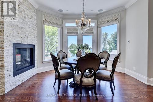 4038 Lakeshore Road, Burlington (Shoreacres), ON - Indoor Photo Showing Dining Room With Fireplace