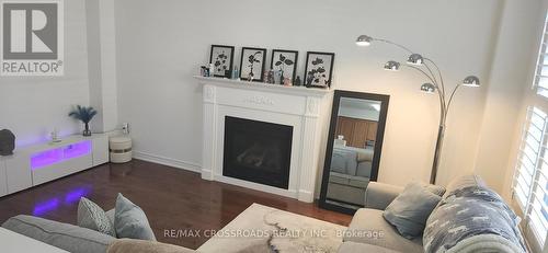 73 Eakin Mill Road, Markham (Wismer), ON - Indoor Photo Showing Living Room With Fireplace