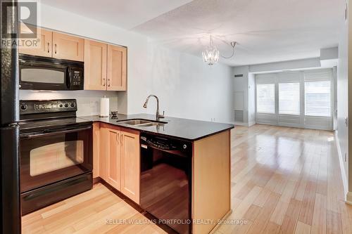 709 - 2181 Yonge Street, Toronto (Mount Pleasant West), ON - Indoor Photo Showing Kitchen With Double Sink