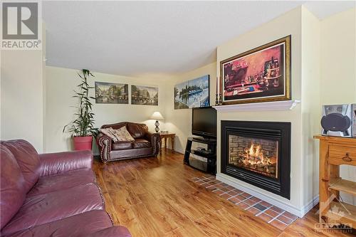 1931 Stonehenge Crescent, Ottawa, ON - Indoor Photo Showing Living Room With Fireplace