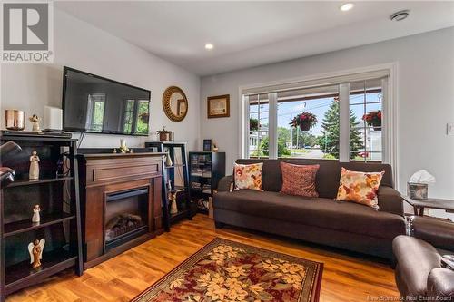 36-38 Bishop, Moncton, NB - Indoor Photo Showing Living Room With Fireplace