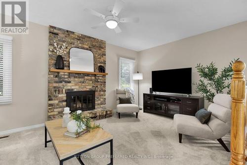 91 Chalfont Road, London, ON - Indoor Photo Showing Living Room With Fireplace