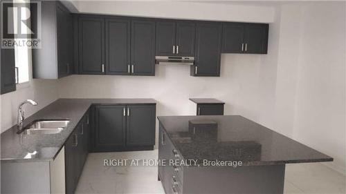 18 Cornerside Way, Whitby (Brooklin), ON - Indoor Photo Showing Kitchen With Double Sink