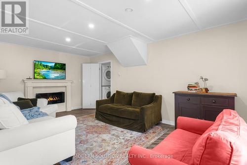 23 Elizabeth Avenue, Tiny, ON - Indoor Photo Showing Living Room With Fireplace