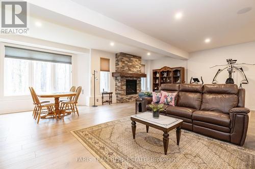 28 Timber Wolf Trail, Springwater (Minesing), ON - Indoor Photo Showing Living Room With Fireplace