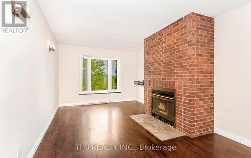 1308 Valerie Crescent, Oakville (Clearview), ON - Indoor With Fireplace