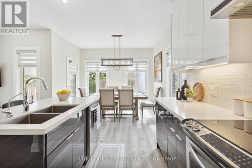 3099 Tillmann Road, London, ON - Indoor Photo Showing Kitchen With Double Sink With Upgraded Kitchen