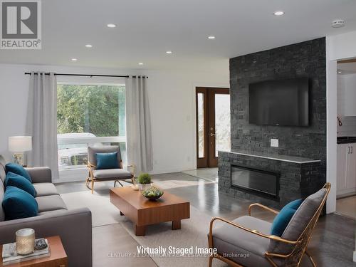 115 Ridley Street, Prince Edward County (Ameliasburgh), ON - Indoor Photo Showing Living Room With Fireplace