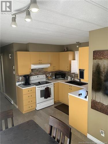 6 2E Av Du Parc, Caraquet, NB - Indoor Photo Showing Kitchen With Double Sink