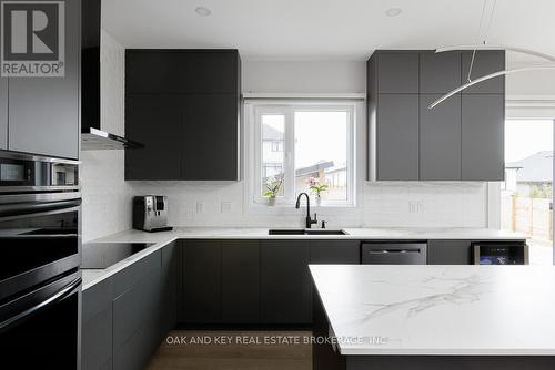 62 Crestview Drive, Middlesex Centre (Komoka), ON - Indoor Photo Showing Kitchen With Upgraded Kitchen