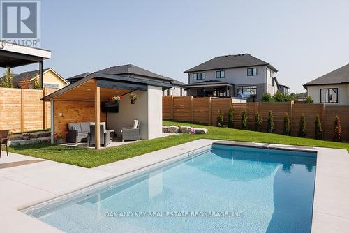 62 Crestview Drive, Middlesex Centre (Komoka), ON - Outdoor With In Ground Pool