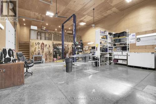 heated workshop/garage - 29830 Centre Road, Strathroy-Caradoc, ON - Indoor Photo Showing Garage