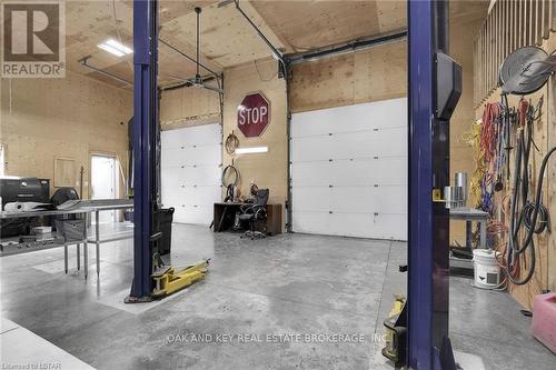 heated workshop/garage - 29830 Centre Road, Strathroy-Caradoc, ON - Indoor Photo Showing Garage