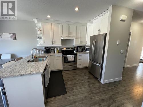 9020 74 Street, Fort St. John, BC - Indoor Photo Showing Kitchen With Double Sink