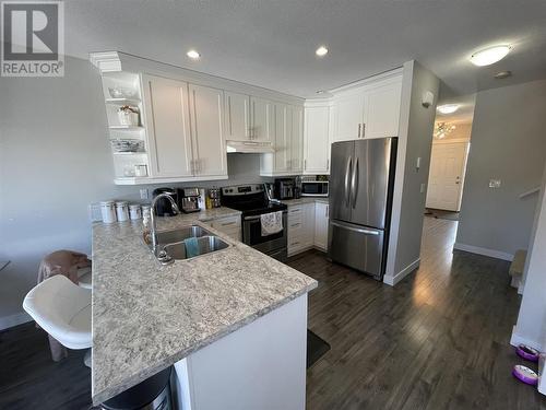 9020 74 Street, Fort St. John, BC - Indoor Photo Showing Kitchen With Double Sink