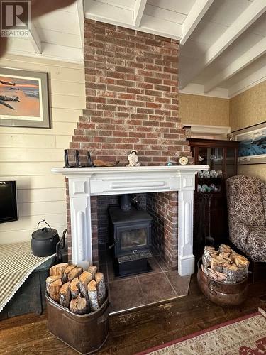 4 Dandy Lane, Trinity, NL - Indoor Photo Showing Other Room With Fireplace