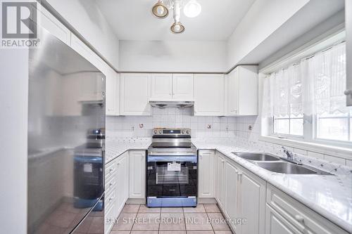 3A - 18 St Moritz Way, Markham, ON - Indoor Photo Showing Kitchen With Double Sink