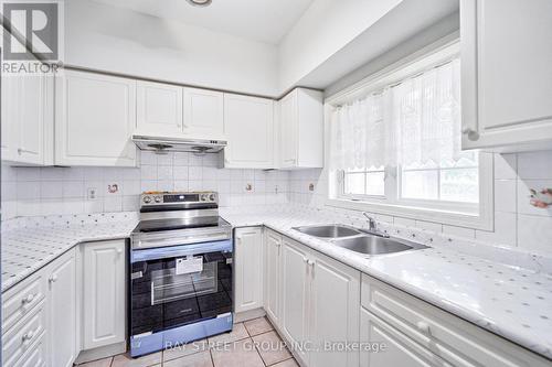 3A - 18 St Moritz Way, Markham, ON - Indoor Photo Showing Kitchen With Double Sink