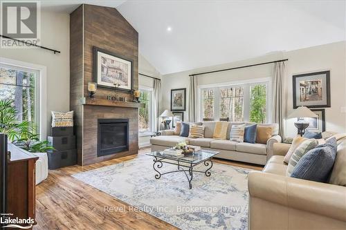 59 Trout Lane, Tiny, ON - Indoor Photo Showing Living Room With Fireplace