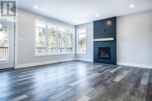 19 Reddley Place, Conception Bay South, NL - Indoor Photo Showing Living Room With Fireplace