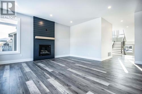 19 Reddley Place, Conception Bay South, NL - Indoor Photo Showing Living Room With Fireplace