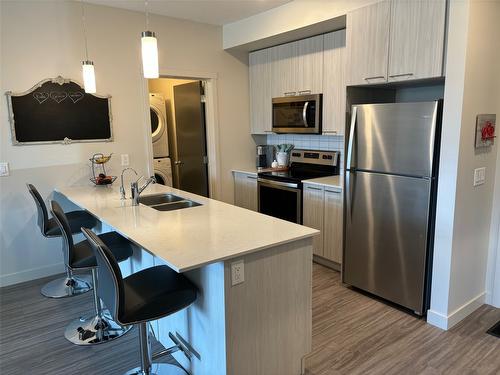 105-2250 Majoros Road, West Kelowna, BC - Indoor Photo Showing Kitchen With Stainless Steel Kitchen With Double Sink