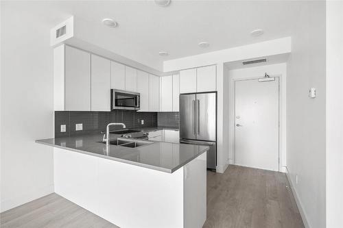 604-1232 Ellis Street, Kelowna, BC - Indoor Photo Showing Kitchen With Double Sink