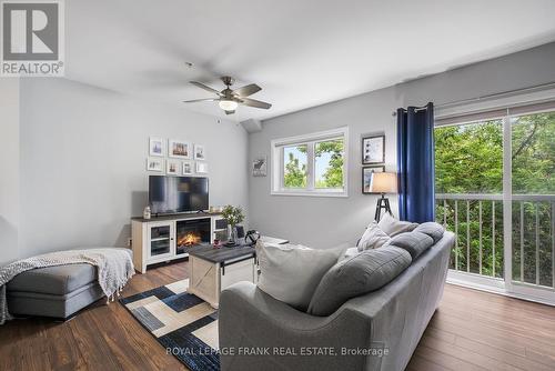 303 - 112 Simcoe Road, Bradford West Gwillimbury (Bradford), ON - Indoor Photo Showing Living Room