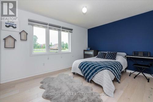 8 Bell Avenue, New Tecumseth, ON - Indoor Photo Showing Bedroom