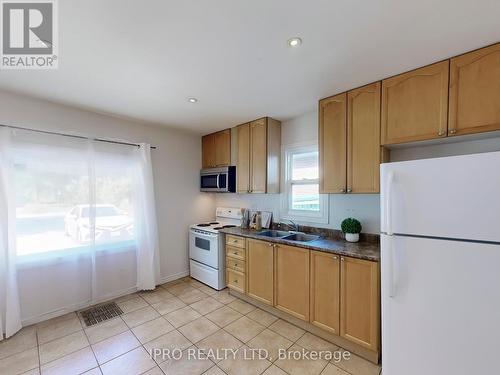 4 Mcmurchy Avenue S, Brampton (Downtown Brampton), ON - Indoor Photo Showing Kitchen With Double Sink