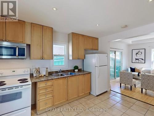 4 Mcmurchy Avenue S, Brampton (Downtown Brampton), ON - Indoor Photo Showing Kitchen With Double Sink