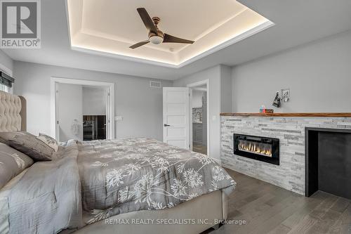 248 Summer Street, Windsor, ON - Indoor Photo Showing Bedroom With Fireplace