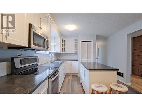 895 Theodora Road, Kelowna, BC - Indoor Photo Showing Kitchen With Double Sink