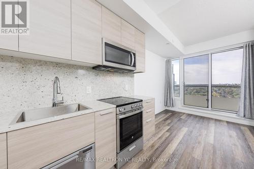 2110 - 75 Canterbury Place, Toronto, ON - Indoor Photo Showing Kitchen With Upgraded Kitchen